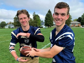 Delhi Raiders running back Tre Hodder, left, and Raiders quarterback Adam Leatherland accounted for four touchdowns in Delhi’s 35-20 win over the Waterford Wolves in Delhi Friday. The win raises Delhi’s record to a league-leading 3-0 while the Wolves fall to 0-2. – Monte Sonnenberg