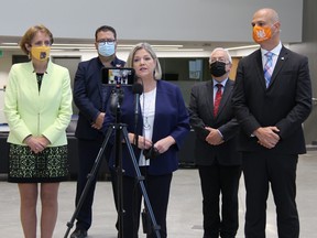 While in Sudbury on Wednesday, Ontario NDP leader Andrea Horwath (centre) says her party would properly fund Laurentian University and a French university in North. Supplied