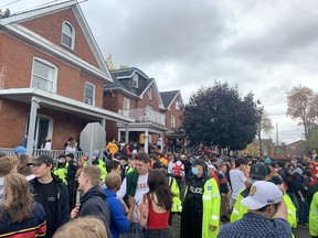 An estimated 8,000 partygoers in the University District gathered on Aberdeen Street on Oct. 16, 2021, despite pleas from the City of Kingston and Kingston Police to limit gatherings during Homecoming.