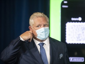CP-Web.  Ontario Premier Doug Ford attends a press briefing at the Queens Park Legislature in Toronto on Friday, October 15, 2021. THE CANADIAN PRESS/Chris Young ORG XMIT: chy112