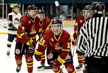 Timmins forward Justin Charette leads teammates, from left, Riley Dubois, Bode Dunford and captain Tyler Schwindt to the bench as they celebrate his first-period goal during the Rock’s 4-1 victory over the Kirkland Lake Gold Miners at the McIntyre Arena Sunday afternoon. Charette has now scored goals in two-straight games. THOMAS PERRY/THE DAILY PRESS