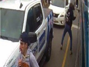 The two men wanted for vandalizing a Kingston Transit bus in Kingston on Saturday, Oct. 16.