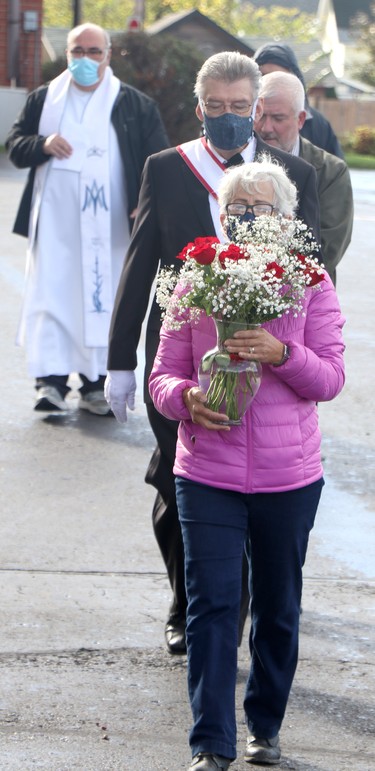 Claudette Breton leads procession during a rosary rally at Our Lady of Good Counsel Catholic Church on Saturday, Oct. 16, 2021 in Sault Ste. Marie, Ont. (BRIAN KELLY/THE SAULT STAR/POSTMEDIA NETWORK)