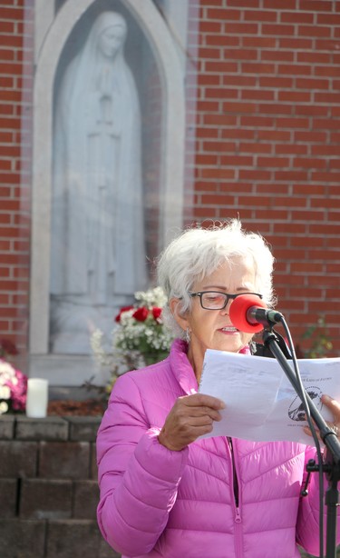 Claudette Breton participates in a rosary rally at Our Lady of Good Counsel Catholic Church on Saturday, Oct. 16, 2021 in Sault Ste. Marie, Ont. (BRIAN KELLY/THE SAULT STAR/POSTMEDIA NETWORK)