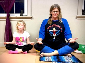 Kelly Spencer, right, and her step-daughter practise The Art of Chillin'. (Submitted)