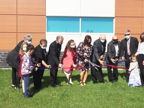 Dignitaries participating in the ribbon cutting ceremony included: Rose Burton Spohn, Jean McGregor Andrews, Bishop Thomas Dowd, Sandra Turco, Vicky Arsenault, Norman Courtemanche, Vincent Lacroix and Paul Henry.