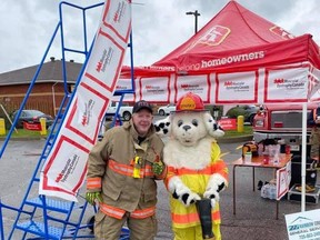 On Saturday, Oct. 16, the Nairn & Hyman Fire Department held a fundraiser for Muscular Dystrophy Canada in the parking lot of Jeremy’s Truck Stop on Highway 17 in Nairn raising $2,000 for their charity. Trevor McVey and Sparky were on hand.