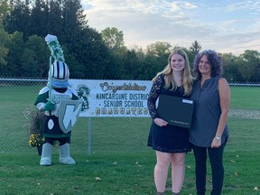 Alison Pope stands with her teacher, Cati VanVeen, at the photo-op that was set up across the street. Hannah MacLeod/Kincardine News