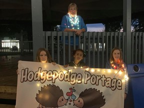 The "Hodgepodge Portage", Gail MacKay with granddaughters Adele Wiggerman and Miyah Watson with friend Rae Robertson led a crowd of about 100 people down mainstreet Kincardine on Wednesday, October 13 to show their support for Mandi Cartwright, who has family roots in Kincardine and is currently suffering from stage 4 cervical cancer. "Illuminight" took place in both Kincardine and Paris, where Mandi currently resides with her mother, at the same time. Hannah MacLeod/Kincardine News