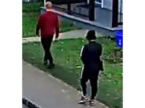 Nico Soubliere, 29, and Carl-Alen Delphin, 20, in seen in his surveillance image as they walk in the University District of Kingston last Saturday.