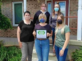 South West Ontario Veterinary Services’ Listowel employees  Emily Moore and Mereditch Jack (Back) and Jennifer Ohm, Mandi Ropp, and Jennie McEwan, celebrate the company’s recent certification as a living wage employer. (Contributed photo)