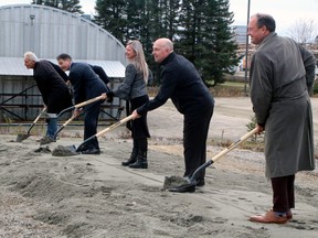 North Bay and District Chamber of Commerce president Peter Chirico, left, Nipissing-Timiskaming MP Anthony Rota, Hut 8 CEO Jaime Leverton, Validus Power Corp. president and CEO Todd Shortt and North Bay Mayor Al McDonald turn the sod for a new data mining facility at the site, Monday.
PJ Wilson/The Nugget