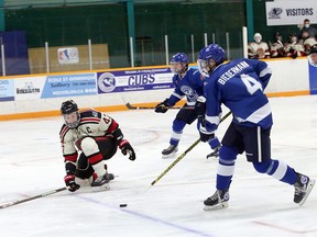 Blind River bavers defenceman Samuel Davies (47) looks to block a pass by Greater Sudbury Cubs forward Billy Biedermann (4) to teammate Pineshish Whiteduck (22) on a two-on-one rush during first-period NOJHL action at Gerry McCrory Countryside Sports Complex on Thursday, October 21, 2021.