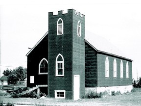 This photo was taken of the United Church in Nampa in the 1970s. The building was completed in 1949. The tower was removed around 1989 when the front extension was added.