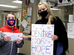 Dieter Irmen delivers the money he raised to the Centre of Hope in downtown Fort McMurray on Saturday, October 16, 2021. Laura Beamish/Fort McMurray Today/Postmedia Network