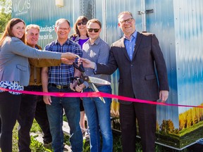 Melissa Nelson, West Central Airshed Society (WCAS) board chairperson, left, WCAS Executive Director Gary Redmond, right, and Drayton Valley and Brazeau County representatives cut the ribbon on an air quality monitoring station in June 2019. WCAS wants to build a station like Drayton Valley’s in Whitecourt.