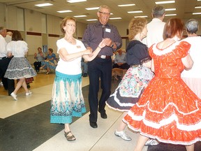 Janet Whitlock and Jim Macleod take part in the Wallaceburg Baldoon Squares' last event on Wednesday, May 6, 2015 at Wallaceburg District Secondary School. The Wallaceburg square dance club folded after 45 years of acrtivity. File photo/Courier Press