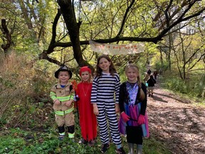 Theo, Isla and Evey Saxton with Orlaith Groome prepare to enter the woods for a spooky scavenger hunt at Geddes Park on Sunday, October 24. Hannah MacLeod/Kincardine News