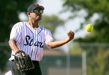 Shaun Robbins pitches during a slo-pitch game at Fergie Jenkins Field at Rotary Park in Chatham, Ont., on Saturday, Oct. 2, 2021. Mark Malone/Chatham Daily News/Postmedia Network