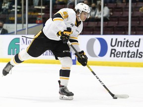 Sarnia Sting's Nolan Burke shoots against the Windsor Spitfires in the first period at Progressive Auto Sales Arena in Sarnia, Ont., on Friday, Oct. 8, 2021. Mark Malone/Chatham Daily News/Postmedia Network