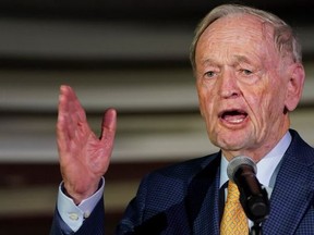 Former prime minister Jean Chretien introduces Prime Minister Justin Trudeau at an election campaign rally in Brampton on Sept. 14, 2021.