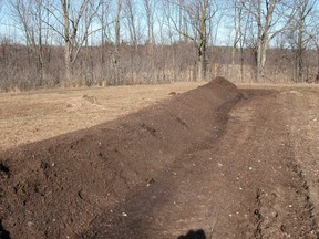 An on-farm dead stock composting pile