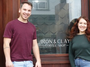 Barista Eric Herr and Owner-Operator Krystal Nisly standing outside of Iron & Clay not long after it's Kenora grand opening.