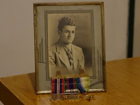 Joseph Carver in his youth, along with the three medals he received shortly before his death.