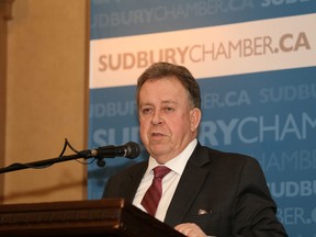 JOHN LAPPA/THE SUDBURY STAR/QMI AGENCY Michael Gravelle, Minister of Northern Development and Mines, makes a point at a Greater Sudbury Chamber of Commerce luncheon in Sudbury, ON. on Thursday, March 27, 2014. See video at www.thesudburystar.com