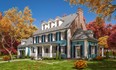 3d rendering of modern classic house in colonial style in autumn day