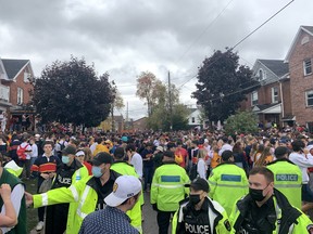 Thousands of revellers gathered on Aberdeen Street in Kingston to celebrate Queen's University's Homecoming on Oct. 16.