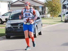 Blake Crossley approaches the finish line of his 2021 Boston Marathon run in Fort McMurray. Supplied image from Blake Crossley