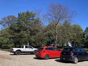 A trio of vehicles parked Tuesday afternoon at Kelso Beach Park in Owen Sound. City council decided Monday night to not further investigate the idea of charging non-residents to park at Harrison Park and Kelso Beach. DENIS LANGLOIS