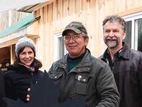 Cape Croker Park manager Nathan Keeshig, centre, with Pauline and Rick MacLeod Farley, who prepared feasibility and business plans for a maple syrup operation at the park. Nominations by Pauline MacLeod Farley led to three Ontario Tourism Resiliency Awards for the park. (Supplied photo)