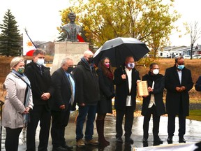 Councillors Heather Spearman (from left to right), Darrell Belyk, Al Jones, Ron Chapman, Tina Petrow, and Mayor Peter Brown accept an award from Philippine Consul General Zaldy Patron and Associate Minister of Immigration and Multiculturalism Muhammad Yaseen for their roles in establishing the bust of Philippino national hero Dr. Jose Rizel in Nose Creek Park on  October 23.