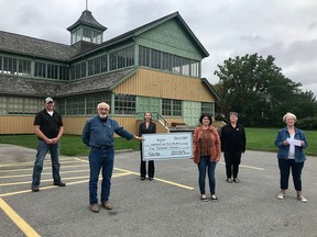 Pictured in front of the Crystal Palace at the Picton Fairgrounds from left: Phil Prinzen, PEC CouncilÕs representative to the Agricultural Society; Larry Everall, president of the PE Ag Society; Shannon Coull, executive director of the PECMH Foundation; Linda Downey from the Storehouse Foodbank; Tina Hiddink, treasurer and secretary for the PE Ag Society and Ellen Brownbill, treasurer of the Picton United Church Foodbank. BRIAR BOYCE PHOTO