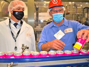 The Truss Beverage Co., located in the former Sears Warehouse in the Northeast Industrial Park, has launched a bursary for Indigenous students in partnership with Indspire, a national charity that invests in the education of Indigenous people. Pictured are Belleville Mayor Mitch Panciuk and Truss plant manager Pat Walsh during a tour of the plant when it opened in October of 2020. DEREK BADWIN FILE