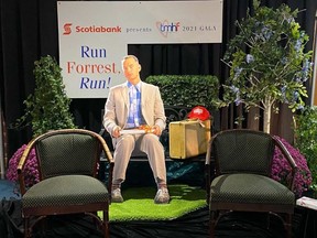 A cutout of actor Tom Hanks as Forrest Gump, the theme of the latest Trenton Memorial Hospital Foundation gala, stands near chairs during the Oct. 16 virtual event. The foundation's executive director says people never know when they'll need hospital care, so withholding donations out of anger about hospital vaccination policies is short-sighted