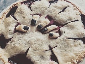 Rachel Weagant is a 36-year-old visual artist from Napanee, who's creating some interesting works of art using unusual media such as this Rasp-bury pie using leftover dough to make fingers coming out of the pie. SUBMITTED PHOTO