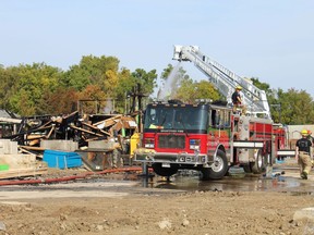 An early morning fire on Monday damaged multiple townhouses under construction at Grey Street and Garden Avenue.