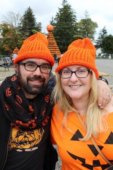 Jeff and Rebecca Sylvester of Brantford get into the spirit of the season with matching knitted pumpkin toques on Saturday at Pumpkinfest. Michelle Ruby