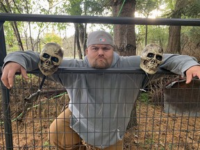 Steve Sault, of Sault Farms Haunted Trail, at the front gate of his Jenkins Road farm in Brant County at the border with Norfolk County . Sault has created a trail of scary scenes and characters for visitors to enjoy. Vincent Ball
