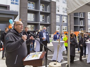 Dave Koot, vice-president of people and culture for Traine Construction and Developments speaks during the grand opening of the first of four apartment buildings at Sterling Square on Conklin Road in Brantford on Thursday.