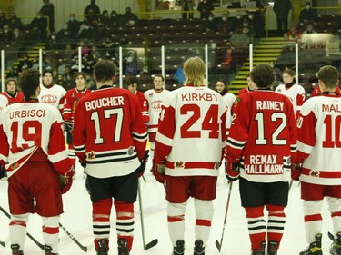 Players from Brockville and Pembroke form a circle at centre ice before the start of the Braves-Lumber Kings game at the Brockville Memorial Centre on Friday night.
Tim Ruhnke/The Recorder and Times