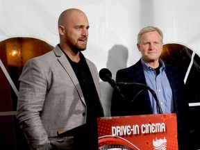 Gordie, left, and Terry Wills speak at Thursday evening's "drive-in" Chamber of Commerce Awards of Excellence Gala after winning the Business of the Year award. (MARSHALL HEALEY/The Recorder and Times)