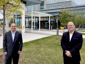Brockville General Hospital President and CEO Nick Vlacholias, left, poses in front of the hospital's main entrance with MPP Steve Clark. (SUBMITTED PHOTO)