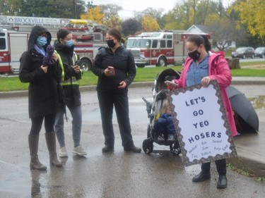 Supporters wait in the rain for their team to hit the course in this year's fire truck pull in the south parking lot of the YMCA in Brockville.
Tim Ruhnke/The Recorder and Times