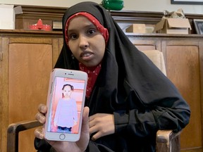 Nasro Mohamed holds up an image of her young daughter, Afnaan, during an interview on Friday.(RONALD ZAJAC/The Recorder and Times)