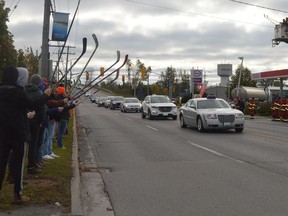 They raised their sticks beside Edward Street as Leo Boivin's procession made its way through the north end of Prescott on Thursday. The Hockey-Hall-of-Fame defenceman died earlier this month at the age of 90.
Tim Ruhnke/The Recorder and Times.