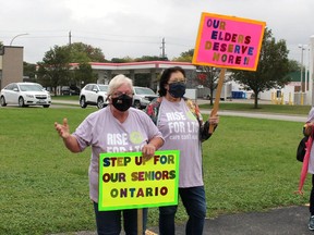 Retired personal support workers Julie Dorner (left) and Kim Brown spoke about the shortage of workers in long-term care homes that has been going on long before the COVID-19 pandemic arrived, during a protest by the Chatham-Kent chapter of the Ontario Health Coalition in front of Chatham-Kent-Leamington MPP Rick Nicholls' Chatham constituency office on Oct. 4. Ellwood Shreve/Postmedia Network